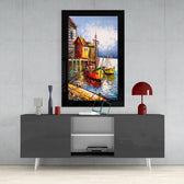 Fishing Town glass wall art styled above a console in a reading nook
