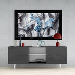 Flower Arrangement glass wall art styled above a console in a reading nook