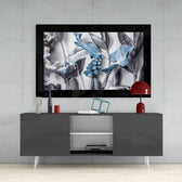 Flower Arrangement glass wall art styled above a console in a reading nook