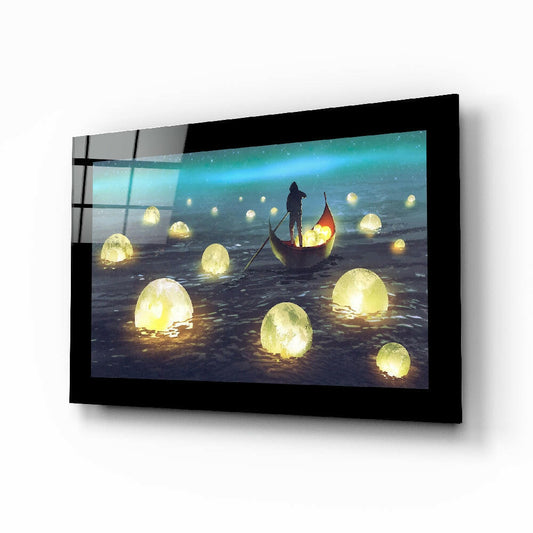 Moon Collector glass wall art displayed above a bed in a bedroom