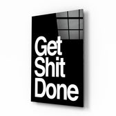 Get Shit Done glass wall art displayed above a desk in a contemporary home office