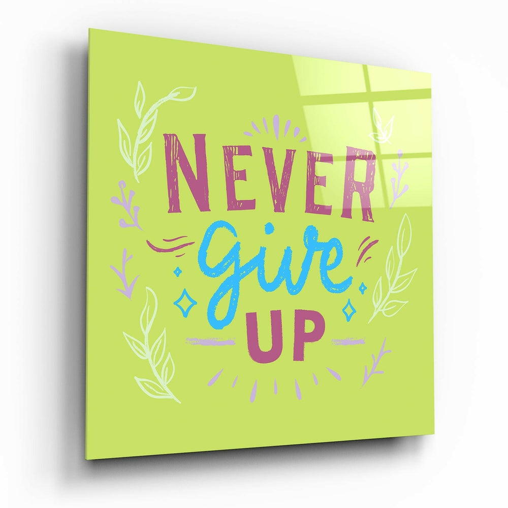 “Never Give Up” Glass Wall Art.