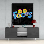 Don't Lose Focus glass wall art styled above a home-office desk as a daily reminder