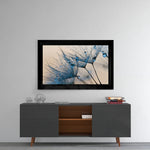 Dandelions glass wall art styled above a vanity in a powder room