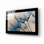Dandelions glass wall art displayed above a bed in a bedroom