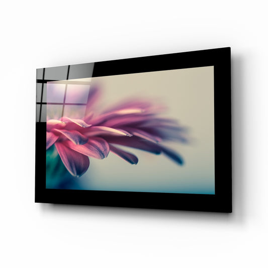 Flower glass wall art displayed above a bed in a bedroom