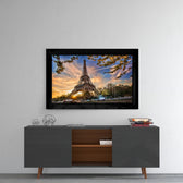 Eiffel Tower glass wall art styled above a console in a guest room