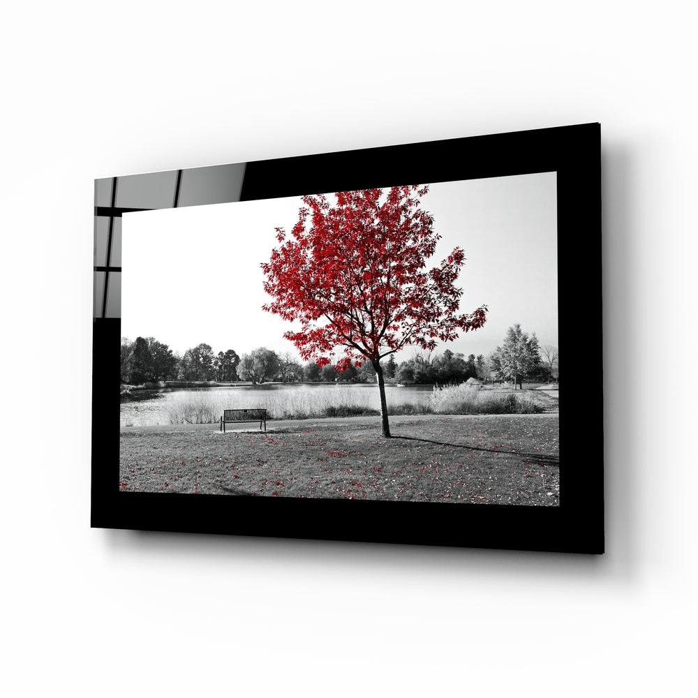 Red Tree glass wall art displayed above a sideboard in a study