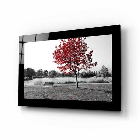 Red Tree glass wall art displayed above a sideboard in a study