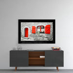 Red Entrance glass wall art styled above a sideboard in a reading nook