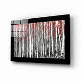 Red Forest glass wall art displayed above a sideboard in a study