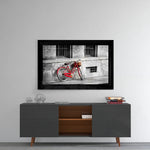 Red Bike glass wall art styled above a sideboard in a study