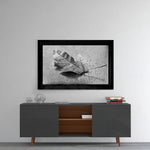 Leaf glass wall art styled above a console in a reading nook