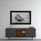 Leaf glass wall art styled above a console in a reading nook