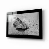 Leaf glass wall art displayed above a sideboard in a study