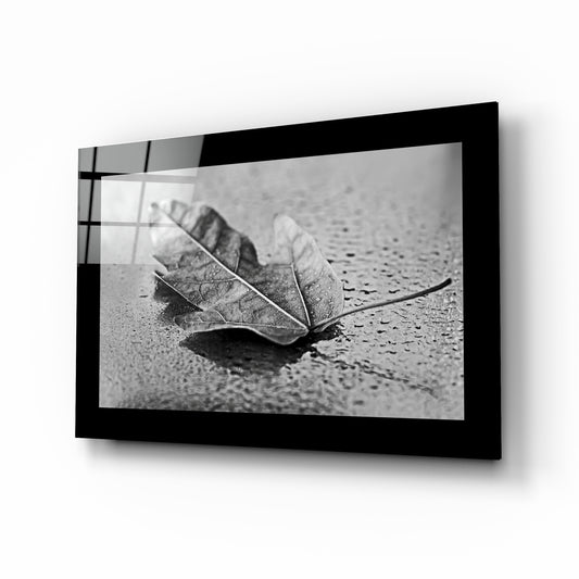 Leaf glass wall art displayed above a sideboard in a study