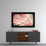 Pink Flower glass wall art styled above a console in a reading nook