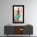 Ballerina glass wall art styled above a console in a reading nook