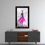Ballerina glass wall art styled above a console in a reading nook