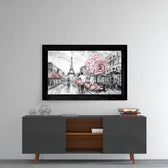 Pink and Paris glass wall art styled above a console in a reading nook