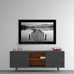 Pier glass wall art styled above a console in a meditation room