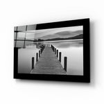 Pier glass wall art displayed above a bed in a bedroom