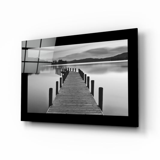 Pier glass wall art displayed above a bed in a bedroom