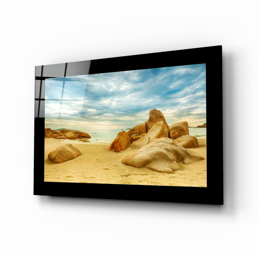 Sand and Rocks glass wall art displayed above a bed in a bedroom