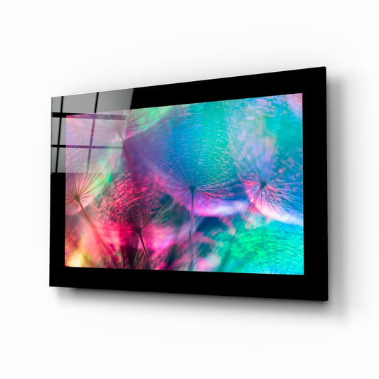 Colorful Dandelions glass wall art displayed above a bed in a bedroom