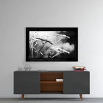 Bloom glass wall art styled above a console in a reading nook