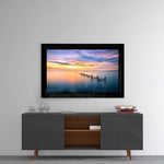 Sunset glass wall art styled above a console in a meditation room