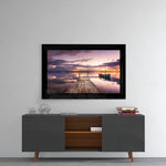 Sunset glass wall art styled above a console in a meditation room