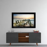 Sunset glass wall art styled above a console in a meditation room