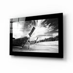 Boats glass wall art displayed above a sideboard in a study