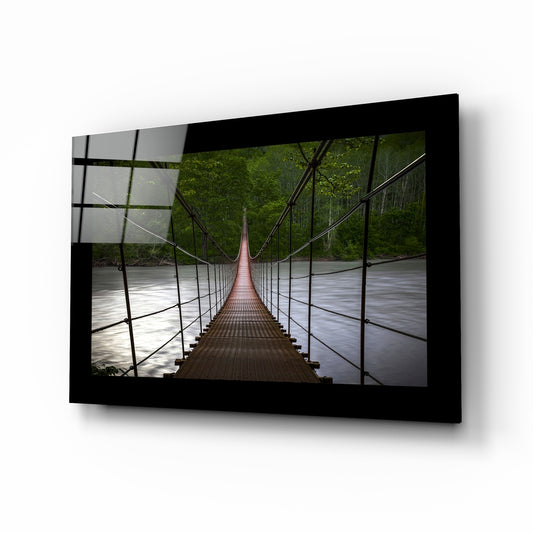 Forest Bridge glass wall art displayed above a sideboard in a study