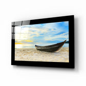 Boat on the Beach glass wall art displayed above a bed in a bedroom