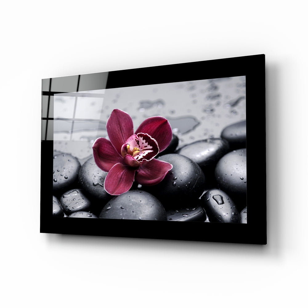 Orchid glass wall art displayed above a vanity in a bathroom