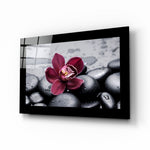 Orchid glass wall art displayed above a vanity in a bathroom