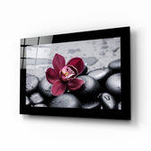 Orchid glass wall art displayed above a vanity in a bathroom
