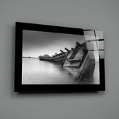 Long-exposure panel bringing monochrome gravity to a coastal cottage
