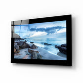 Coast glass wall art displayed above a bed in a bedroom