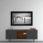 Pier glass wall art styled above a console in a meditation room