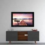 Sunset glass wall art styled above a console in a meditation room