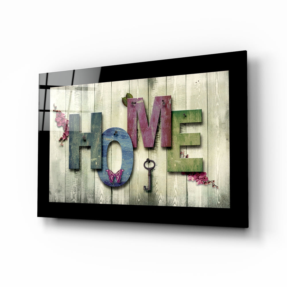 Home glass wall art displayed above a console in an entryway
