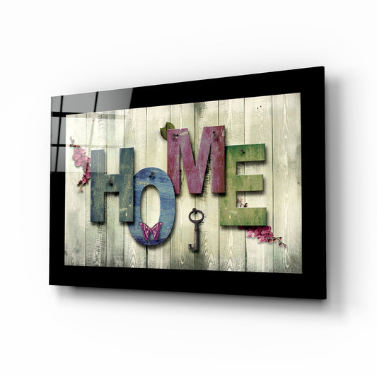 Home glass wall art displayed above a console in an entryway