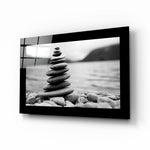 Balance glass wall art displayed above a console in a meditation room