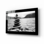 Balance glass wall art displayed above a console in a meditation room