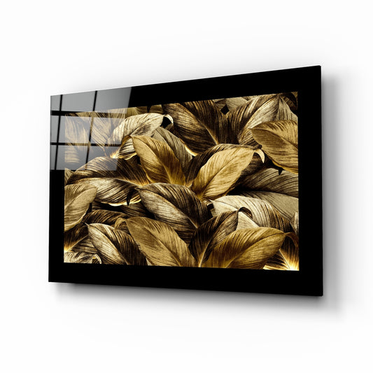 Golden Leaves glass wall art displayed above a sideboard in a study