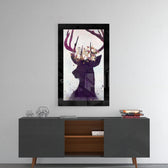 Deer glass wall art styled above a console in a reading nook