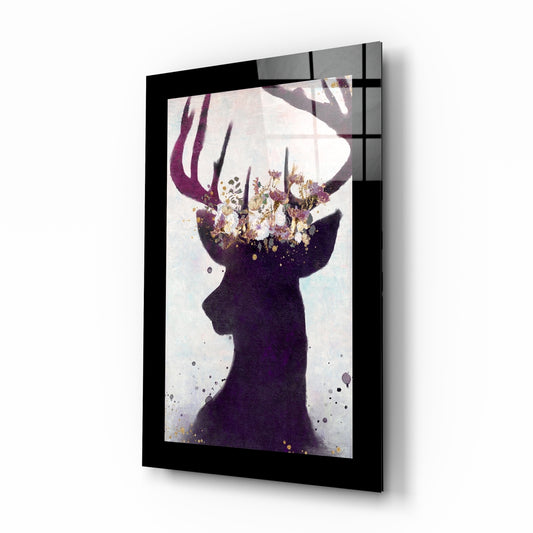 Deer glass wall art displayed above a bed in a bedroom
